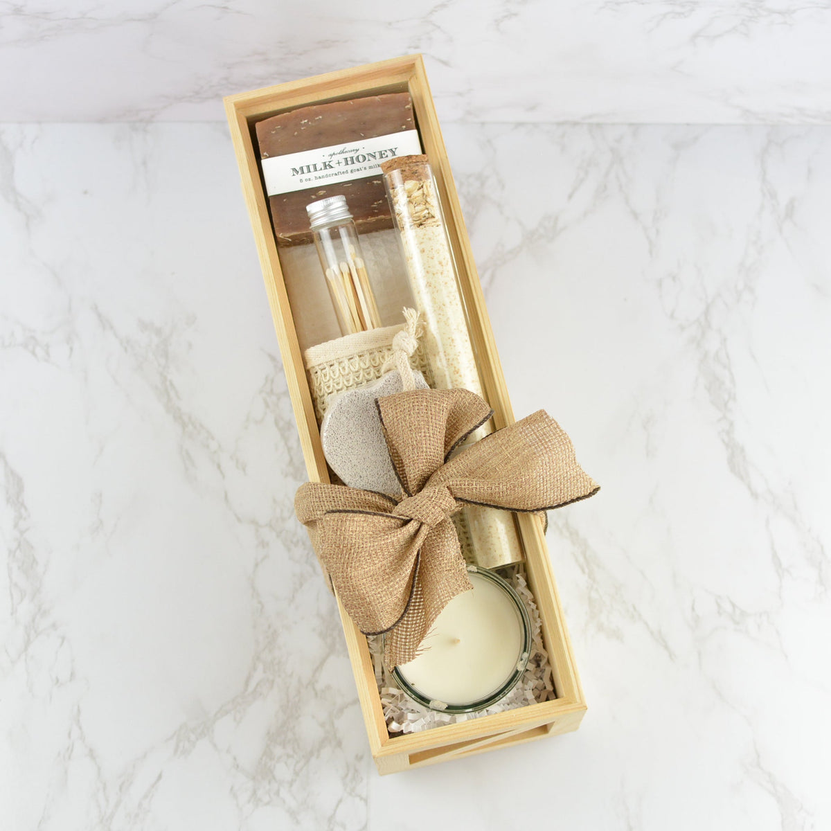 milk and honey spa gift box with wooden box and bath items
