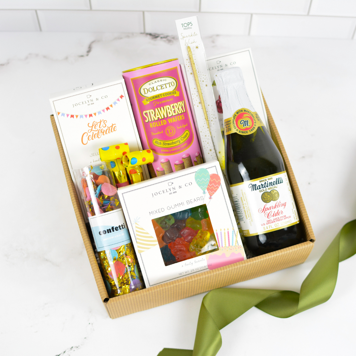 Let’s Celebrate gift box with sparkling cider, candy, and party favors